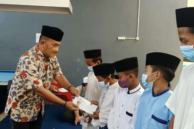 Reskrim Polres OKI Santuni 30 Anak Yatim